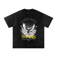 T-shirt oversized Stop Wars noir délavé à plat - colombe de la paix et lettrage graffiti jaune