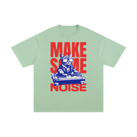 T-shirt oversized chat DJ en vert clair - imprimé Make Some Noise vu de face