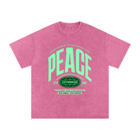 T-shirt oversized PEACE en rose délavé - imprimé varsity vert et mention Stay Awake Stay Positive