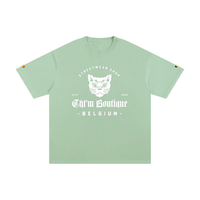 T-shirt oversized logo chat gothique en vert menthe, imprimé blanc CHT'M Boutique Belgium, vue de face