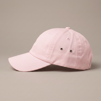 Casquette femme rose pastel de profil, visière incurvée