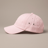 Casquette femme rose pastel de profil, visière incurvée