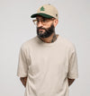 casquette verte beige belge biere