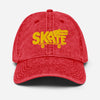 Casquette skate vintage rouge délavé brodée crocodile jaune, vue de face