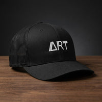 Casquette trucker ART noire avec logo triangle-A brodé blanc - CHT'M Boutique