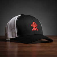 Casquette trucker tête de mort brodée rouge noir et blanc - crâne pirate streetwear CHT'M Boutique