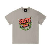 T-shirt enfant oversized Skate All Day en camel grisé - planche noire aux roues dorées