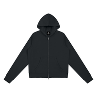 Sweat zippé capuche femme original noir à bord brut, vue de face