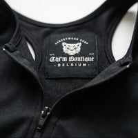 Étiquette intérieure CHT'M Boutique cousue dans le dos de la brassière de sport