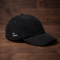 Casquette en velours côtelé noire CHT'M avec broderie "Do Better." sur le panneau latéral, vue de face