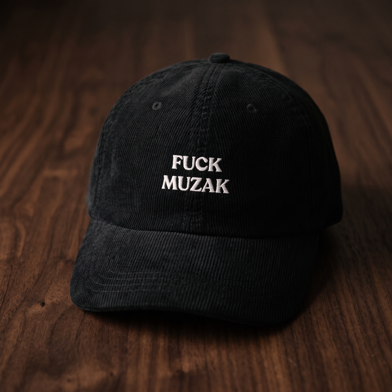 Casquette dad cap en velours côtelé noir FUCK MUZAK - vue de face angle léger