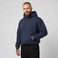 Hoodie boxy original bord brut bleu marine porté par un mannequin CHT'M