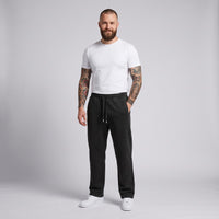 Jogging original délavé vintage noir porté par un mannequin CHT'M