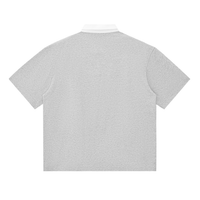 Détail du polo original épaule tombante CHT'M Boutique