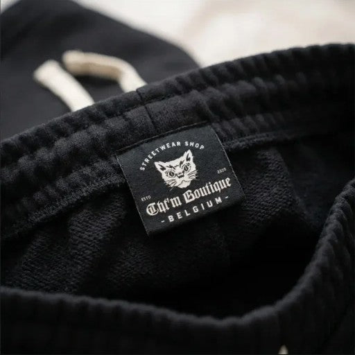 Étiquette intérieure CHT'M Boutique cousue à la ceinture du short