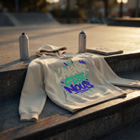 sweat à capuche Gen Z « L'avenir c'est nous » crème posé sur les marches d'un skatepark au coucher du soleil – CHT'M Boutique
