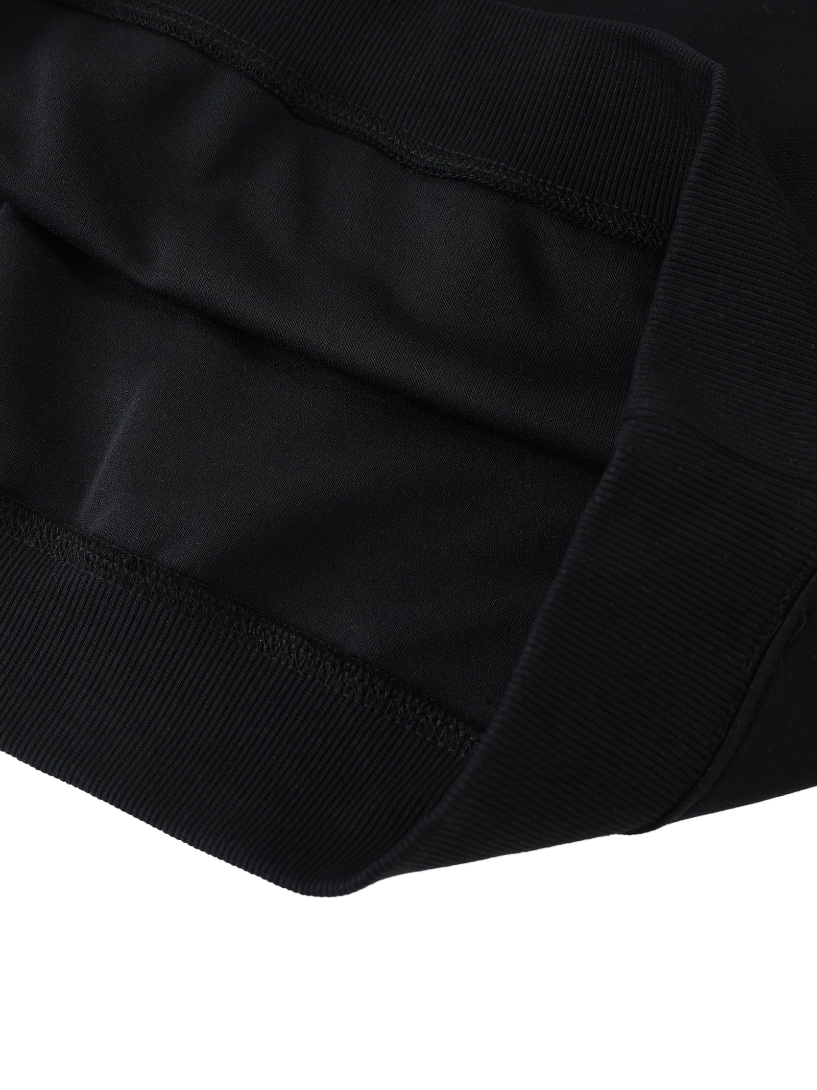 Détail de la coupe oversized du sweat Drum and Bass noir