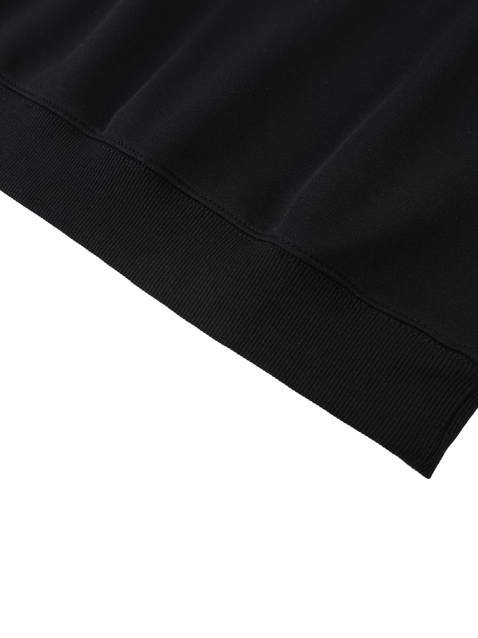 Détail du bas de corps en bord-côte du pull oversize 380 g/m²