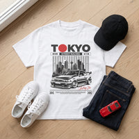 T-shirt enfant oversized Tokyo posé à plat avec baskets, jean et casquette