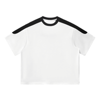 T-shirt oversize original colorblock blanc et noir porté - CHT'M Boutique