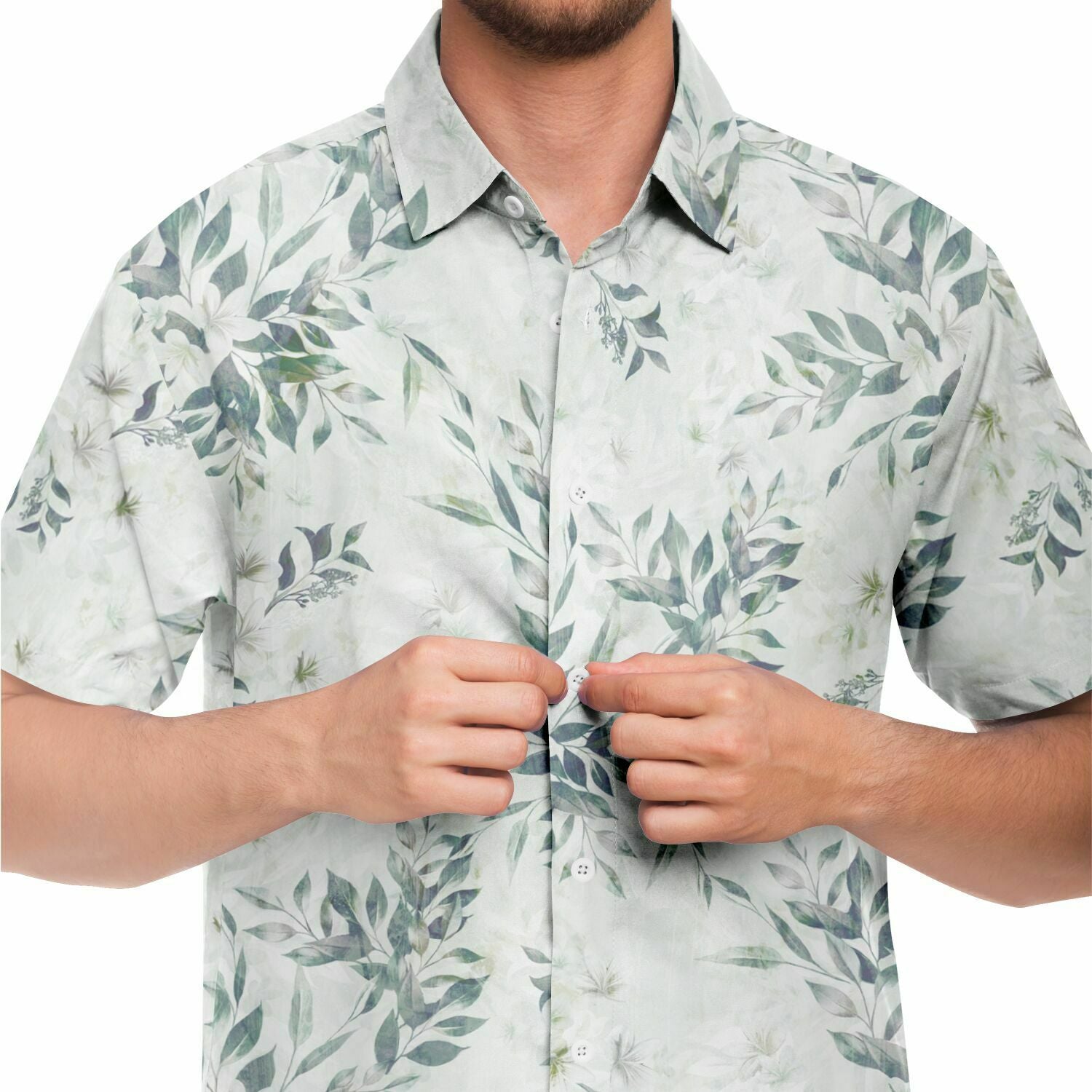 Chemise homme manches courtes blanche à feuillage vert, gros plan sur l'imprimé