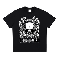 T-shirt oversized Open Your Mind en noir - crâne à crocs, roses et mains de squelette en blanc
