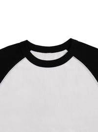 Détail du col rond et de la découpe raglan noire du t-shirt oversized BRUXELLES blanc