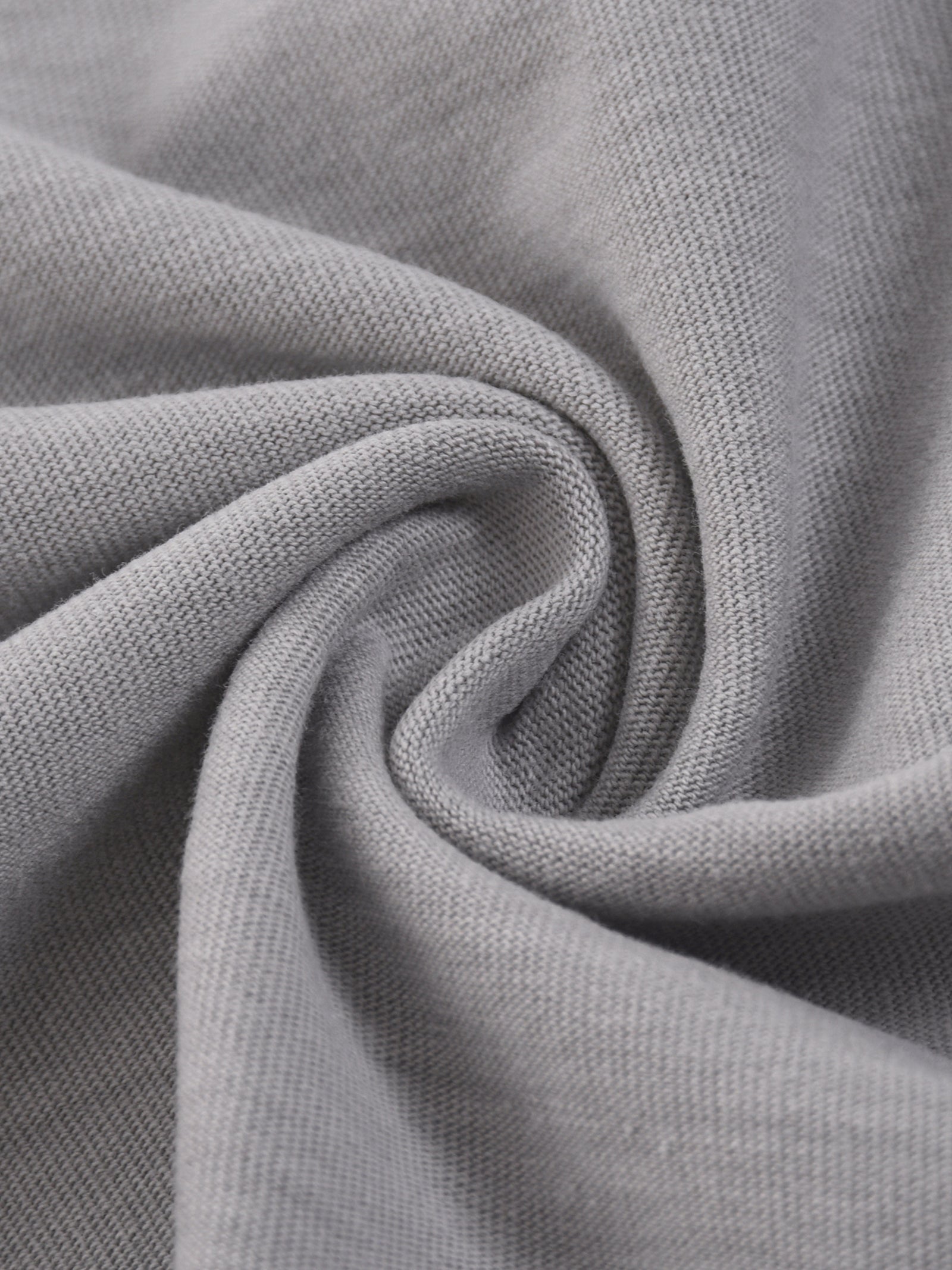 Macro de la maille coton du t-shirt The Poker Face, texture souple