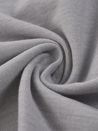 Macro de la maille coton du t-shirt The Poker Face, texture souple