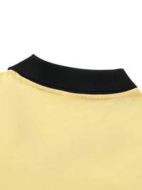 Détail du col noir vu de dos sur le maillot foot belge femme original en maille piquée jaune