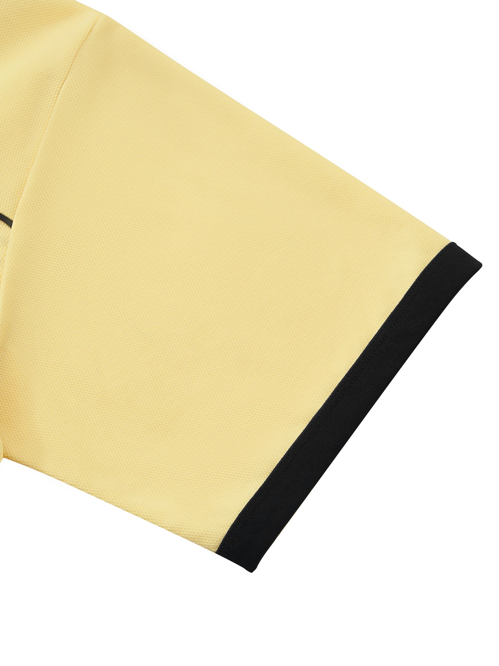 Détail du bord-côte noir de la manche du maillot foot belge femme original