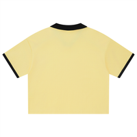 Maillot foot belge femme original – dos uni du crop top jersey jaune avec col et bords de manches noirs