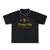 Maillot de foot streetwear Zwanze City Belgique noir, vue de face, col V et signature dorée