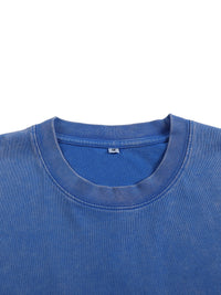 Col rond côtelé du t-shirt belge bleu snow wash - vue rapprochée de l'encolure sur le t-shirt plié