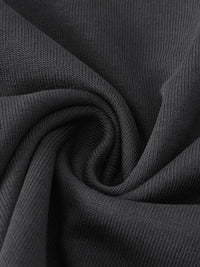 Gros plan sur la maille du coton 400 g/m² du t-shirt belge oversized