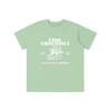 T-shirt enfant original Cool Crocodile vert amande, vue de face avec print crocodile blanc – CHT'M Boutique