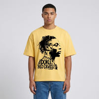 T-shirt oversized Doku jaune citron porté en studio par un mannequin homme, coupe drop shoulder