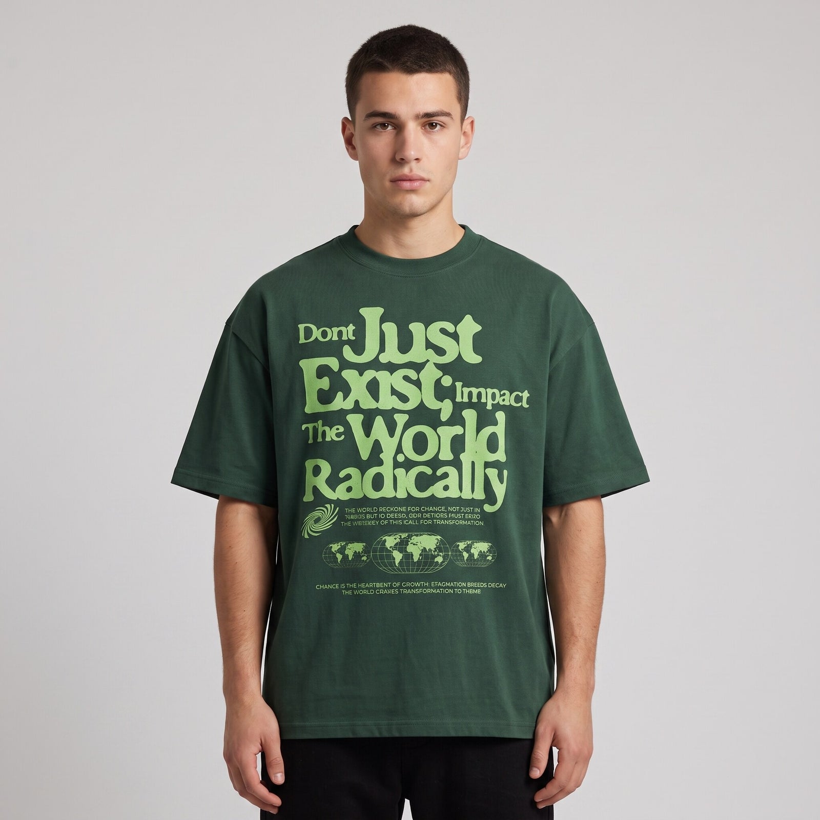 T-shirt oversized vert fonce Impact The World Radically en coton lourd, porte en studio sur fond gris clair