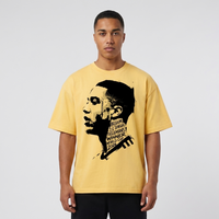 T-shirt oversized Tielemans jaune citron porté en studio par un mannequin homme, coupe ample